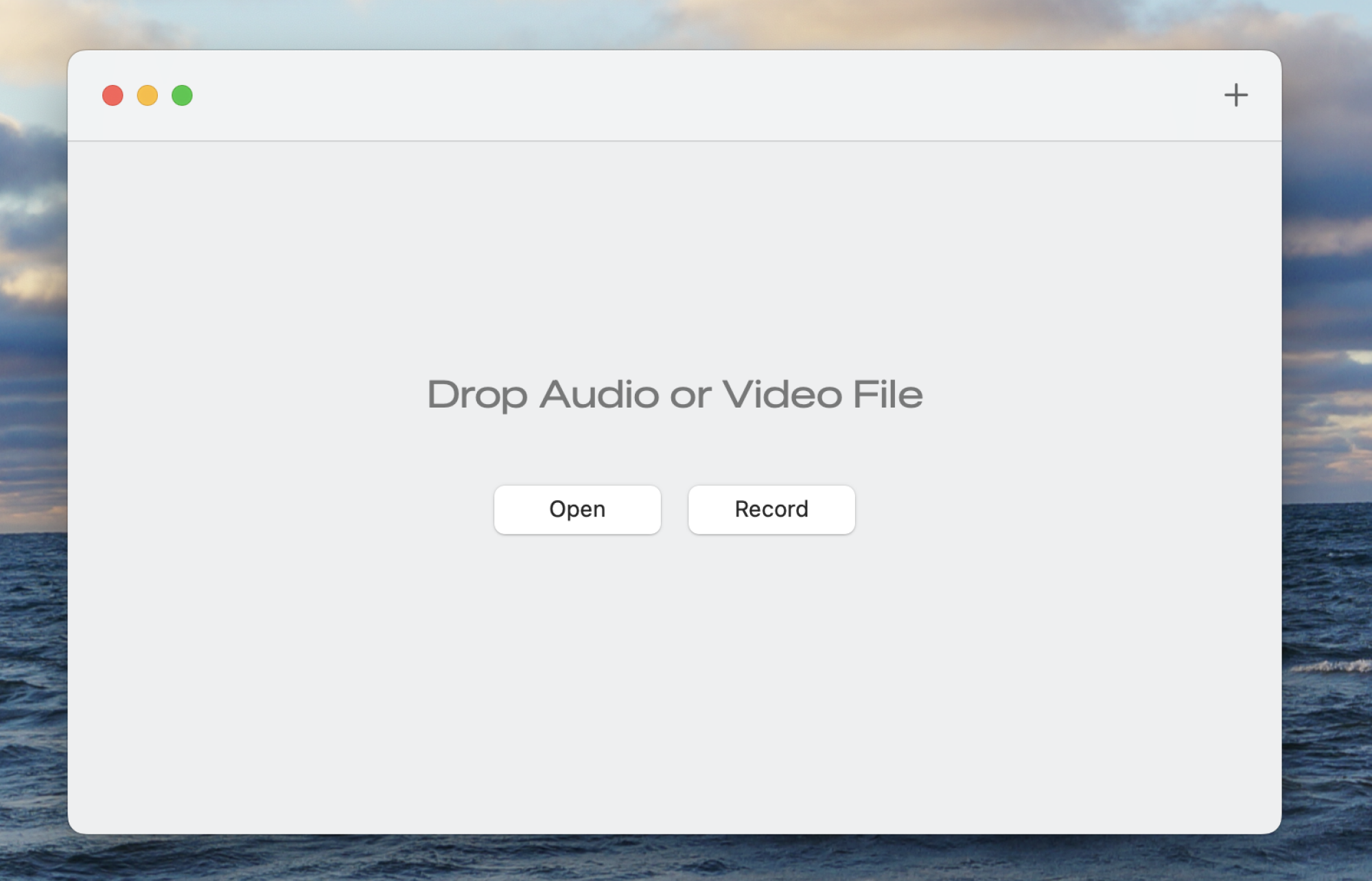 A screenshot of Aiko. The interface is clear—it just says "Drop Audio or Video File" and there are two buttons: "Open" and "Record".