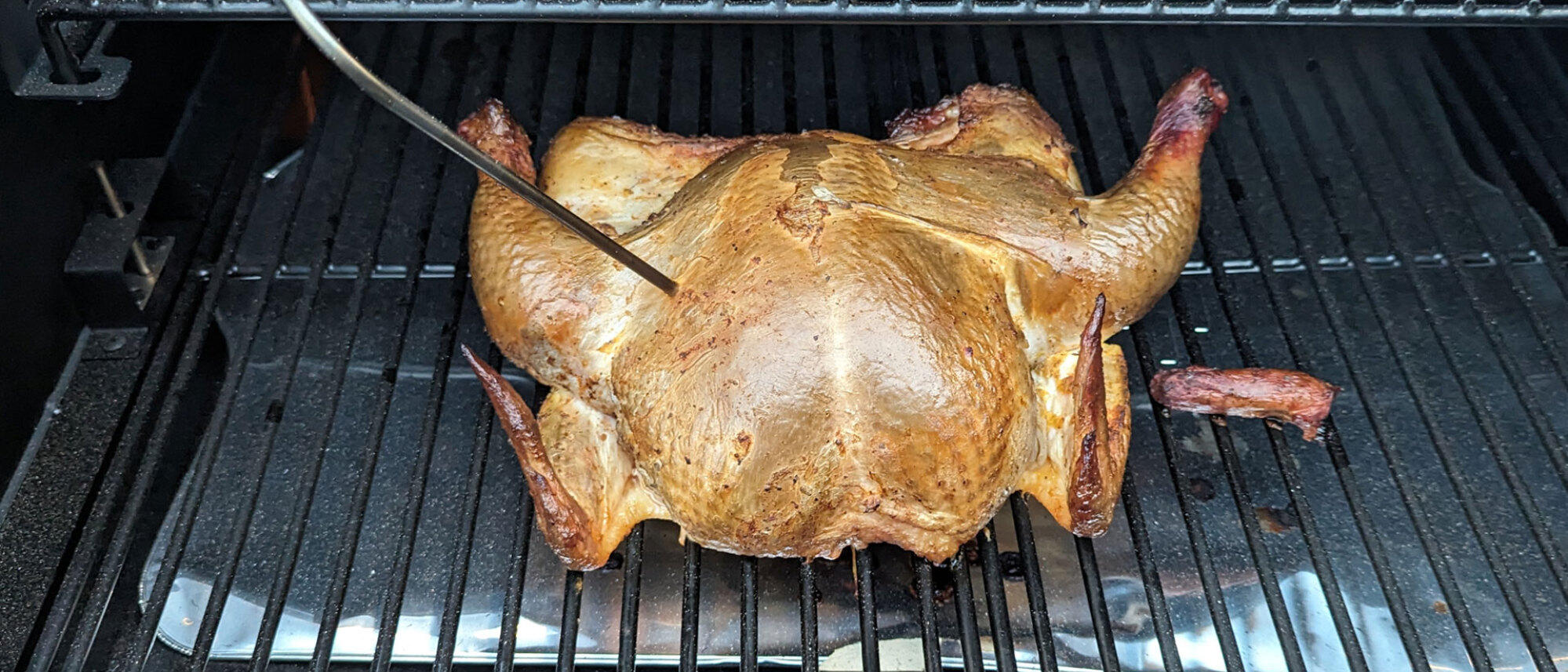 Spatchcocked chicken on a Brisk It Origin 580